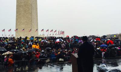 Congressman Espaillat addressing a crowd by the Washington monument about Housing